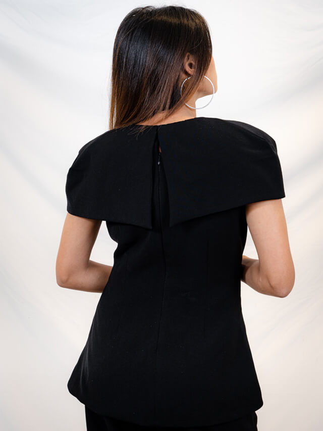 Cape shoulder top and flared pants