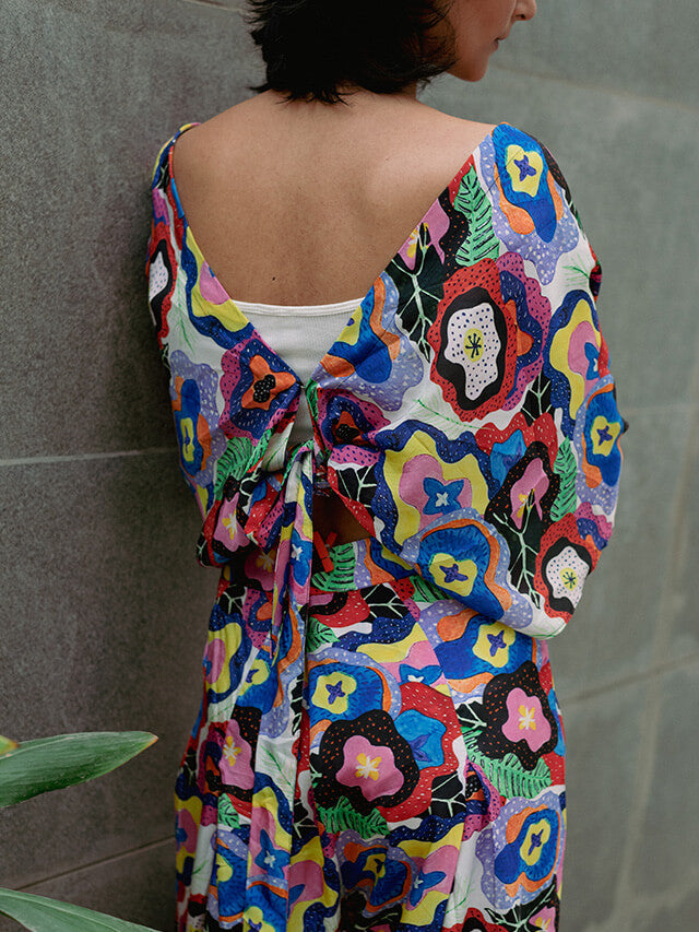 V-neck tie top with box pleat pants