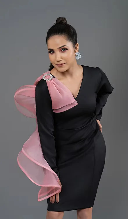 Black dress with peach ruffle