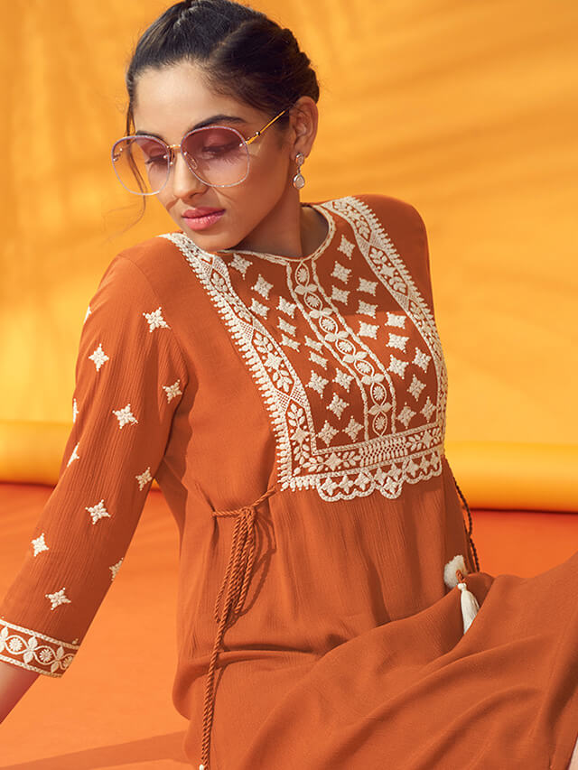 Rust coloured textured chiffon dress