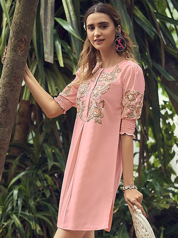 Peach colored italian crepe dress