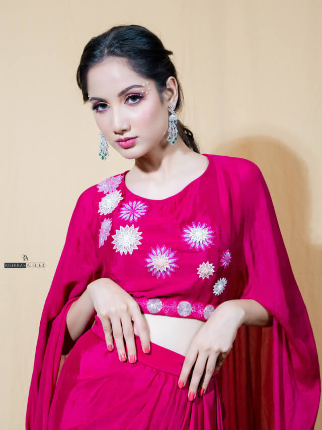Rani pink embellished wings top paired with drape skirt