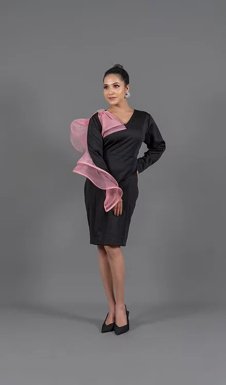 Black dress with peach ruffle